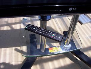 Rent A TV - picture of trolley stand glass shelf on stand.
